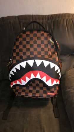 Spray ground backpack