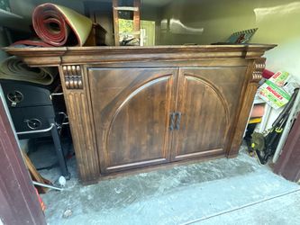 Large Dark Wood Cabinet with Arched Doors