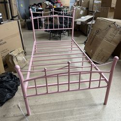 Twin size pink metal bed