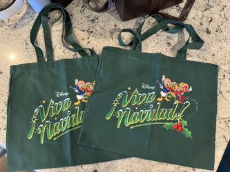 2 Disneyland Christmas bags. Made of fabric and have never been used  $10 each