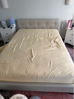 Queen sized beige bed frame