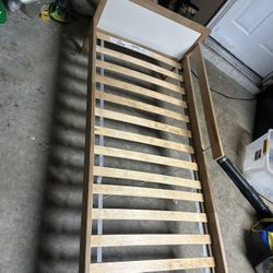 Kids bed frame with gone side bed rail