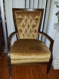 Mahogany antique armchair with tufted back