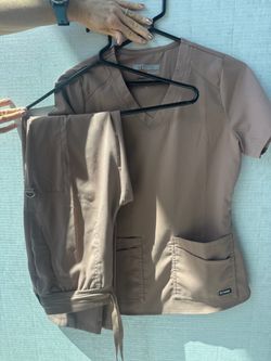 Four XS Women’s Scrub Sets