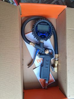 Band new AstroAl tire pressure gauge