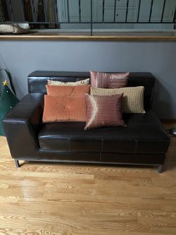 Brown Leather chase lounge