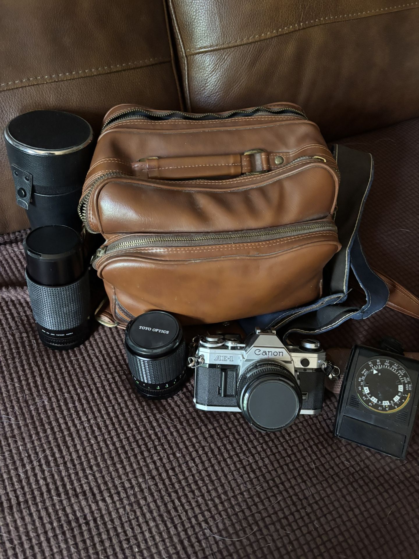Vintage AE-1 Canon Camera With Lenses