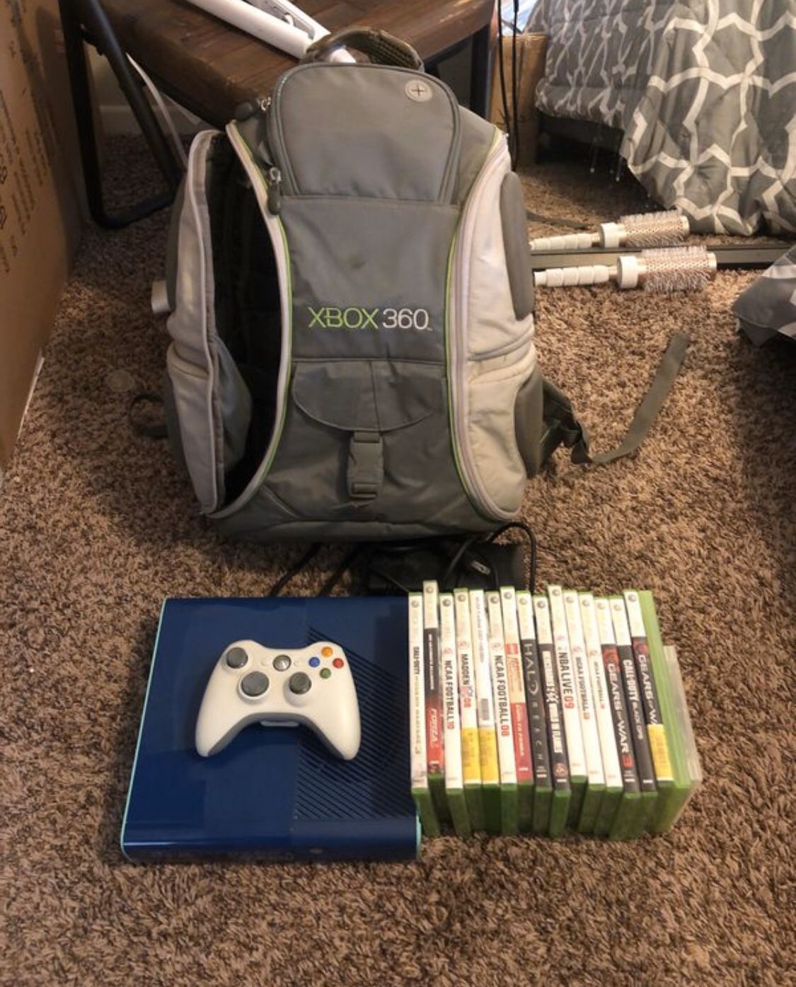 Xbox 360 E 250GB with 17 games, controller and backpack!