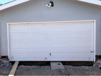 Two car white Garage Door. Must pick up Mission https://offerup.com/redirect/?o=SGlsbHMuY2E=.