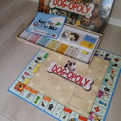 Dog-opoly Monopoly Board Game. Used Excellent. Deer Vly 67th Ave. 85310. Must Pikup