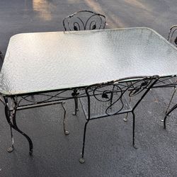 Vintage Wrought Iron Table with four chairs