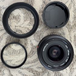 MINT! Minolta 28mm f2.8 lens+hood+ filter + caps