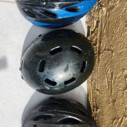 3 child  helmets