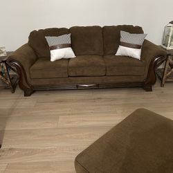 One Brown Couch, One Brown Chair And ottoman