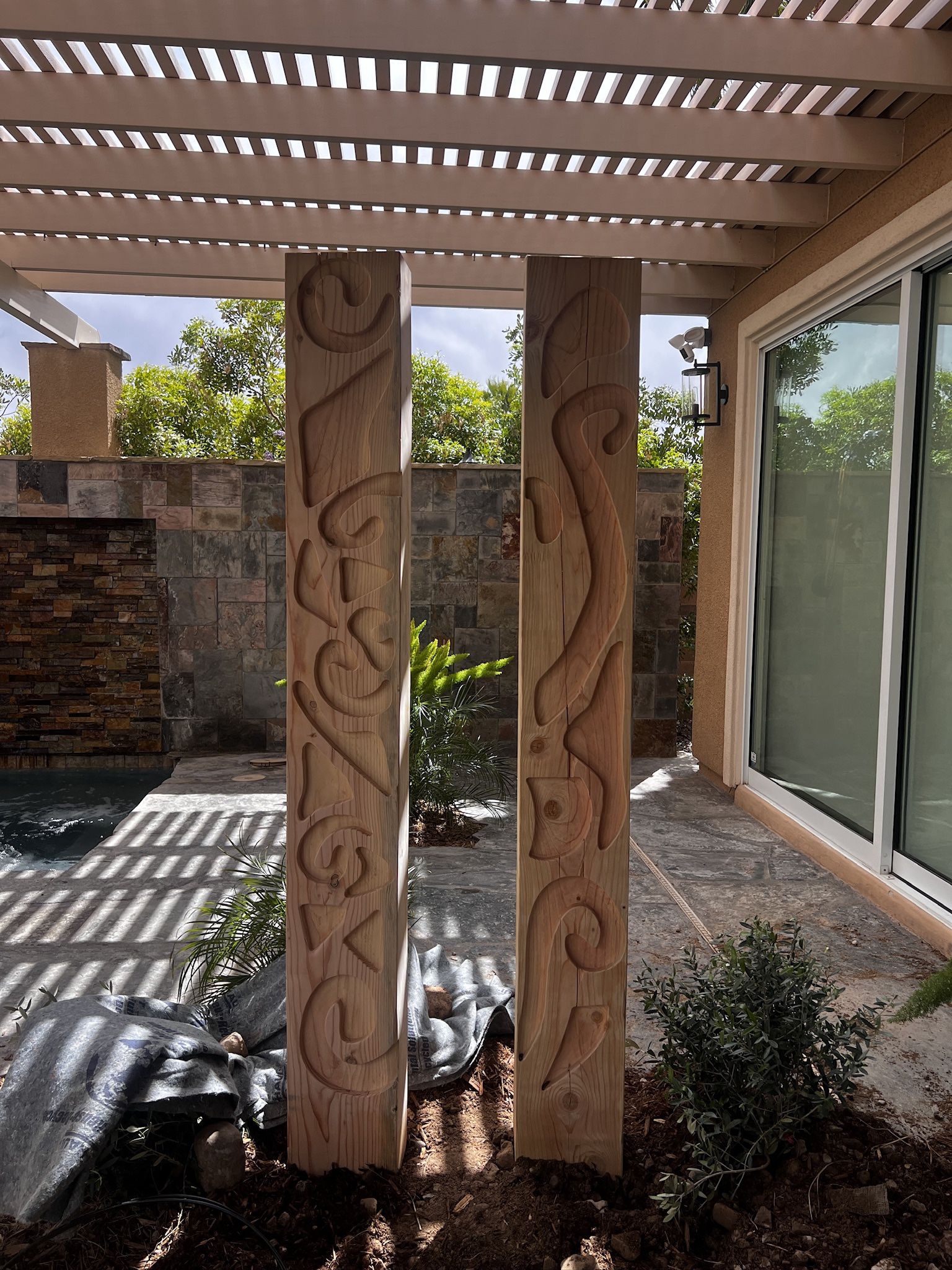 Large custom carved wood posts