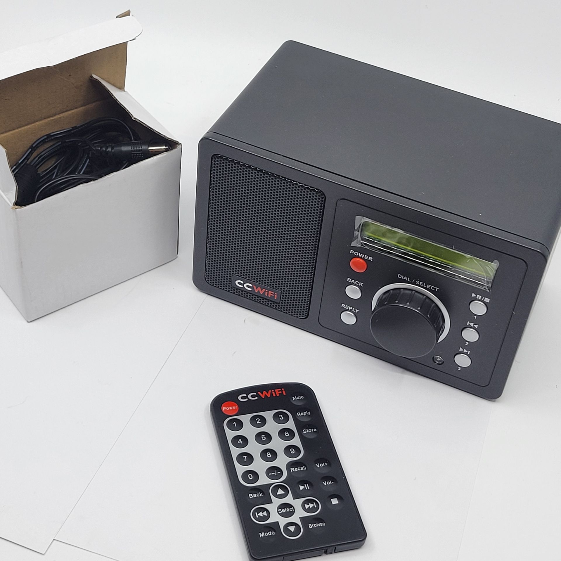 C. Crane CC WiFi Internet Radio , Clock and Alarm New Open box.Including power supply, remote, radio. Manual is missing.Weight 2lb plus shipping ma