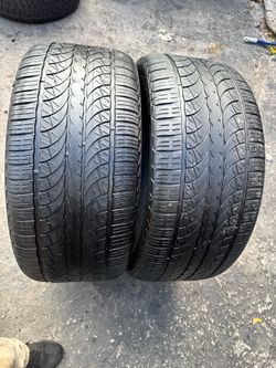 Set of 2 nice tires 305/40/22 ( We install & balance)