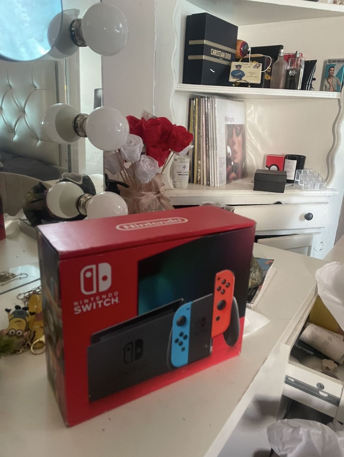 BRAND NEW Nintendo Switch with Neon Blue and Neon Red Joy-Con
