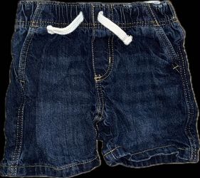 Old Navy dark wash baby pull-on jean shorts with an elasticized waistband and drawstring