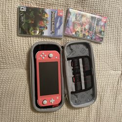 Nintendo Switch Lite and 2 Games