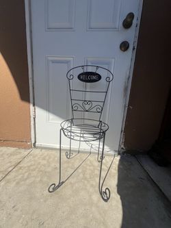 Metal Planter stand or chair for a toy?