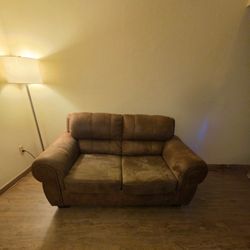 Beautiful brown two-piece Couch And Love Seat