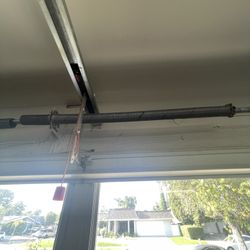 Garage Door Spring Adjustment And Replace 