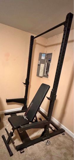 Like new Rugged Maverick Commercial Strength Half Rack with pull up bar and spotter are and hooks