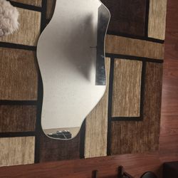 Asymmetrical Mirrors