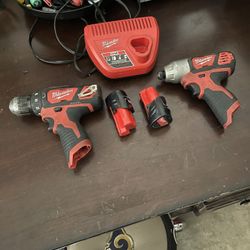 Drill / Impact Gun Combo w/ 2 Batteries And Charger