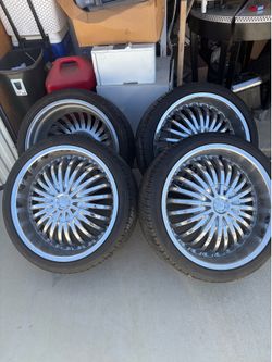 20 inch chrome wheels 500 bucks no scratches no scrapes.