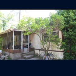 Mobile Home Con Terreno en  Ocala Buena Localización  necesita reparaciones