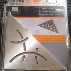 ​Schluter SHELF-E Stainless Steel Corner Shower Shelf (Floral / Curve Design)