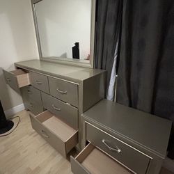 Silver full dresser with mirror, and night stand 