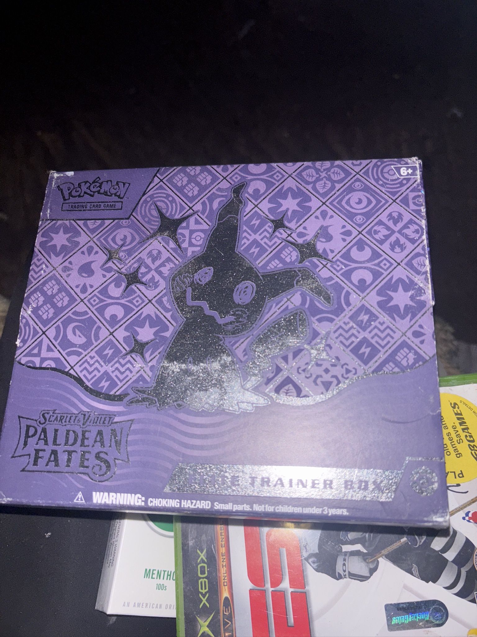 Pokémon Trading Card Game (TCG) Scarlet & Violet—Paldean Fates Elite Trainer Box (ETB). It is a product for the Pokémon TCG, featuring the Paldean Fat