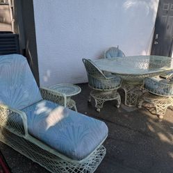 Vintage mcm Fiberglass Patio Table and 4 chairs plus lounger and side table.