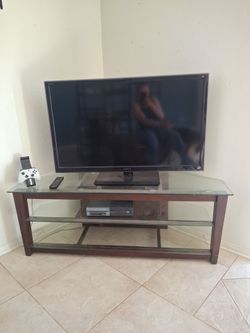 Corner glass and wood entertainment center