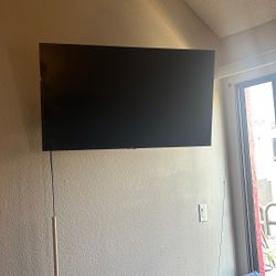 2 Roku 40” TVs with Wall Mounts and Remote Controls 