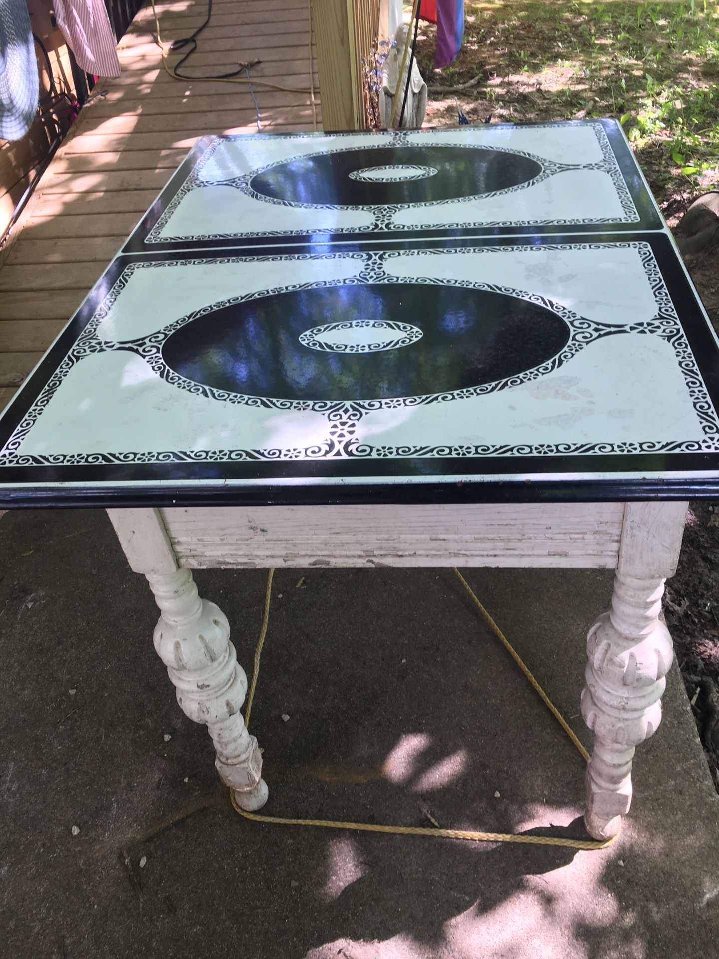 beautiful antique porcelain top table 31x 42 x 30 inches tall.  amazing vintage style