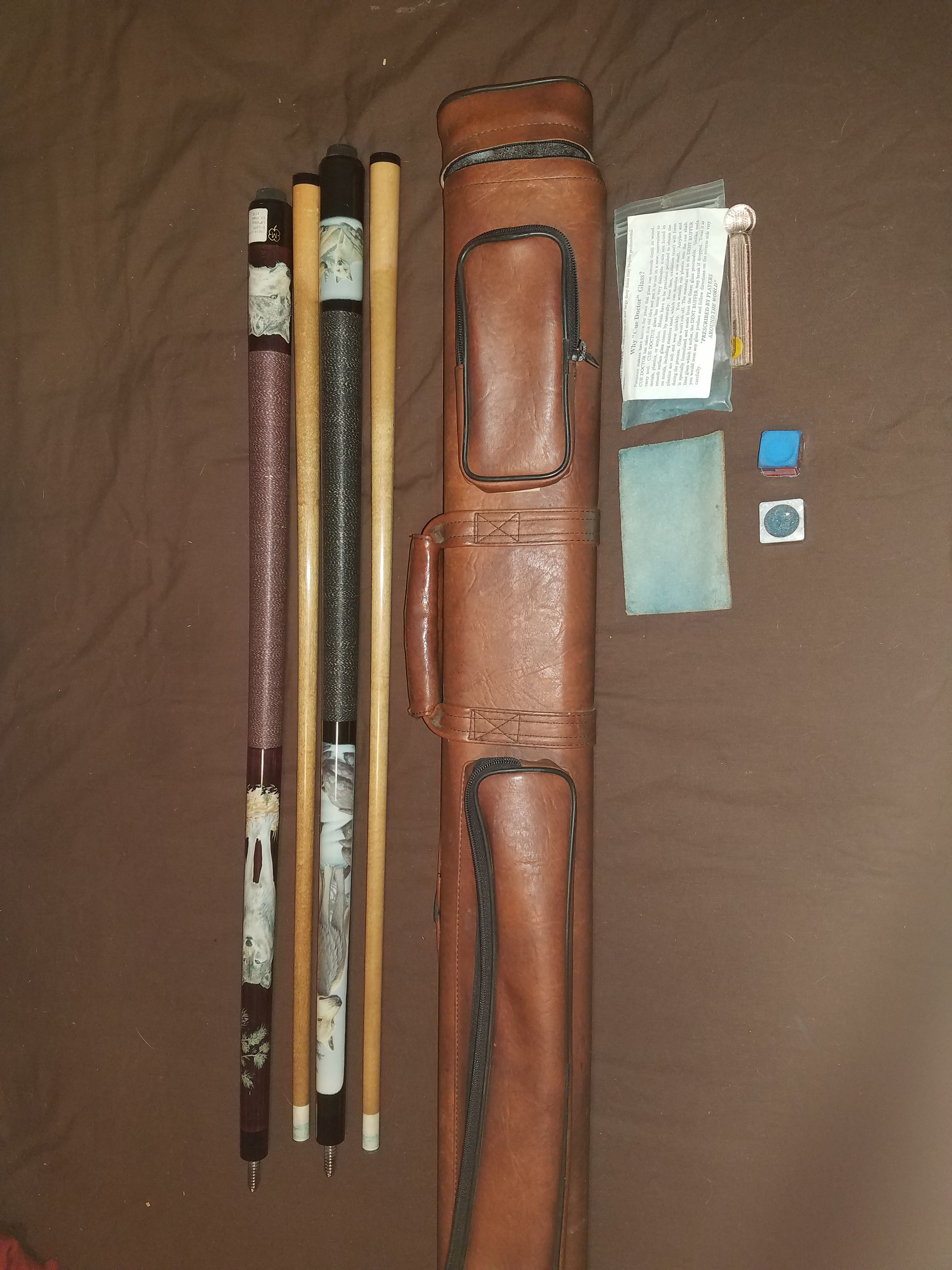 Two Wolf Mcdermott pool cues with Joe Poper's case