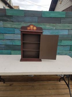 Small cabinet with shelves