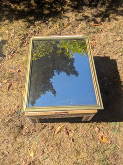 Mirror in brass frame
