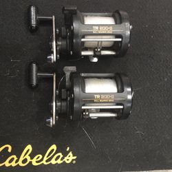 Two Shimano T-200 G   Trolling Reels.  Excellent Condition Big Game 25 # Line   Have Clickers.   Great Entry Level River Trolling Reels.  I Used For S