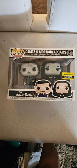 Gomez and Mortricia pop figure