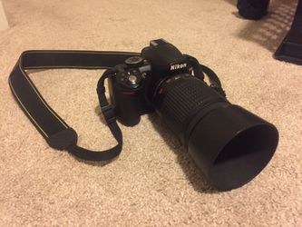 Nikon D3100 DSLR with 55-200mm lens
