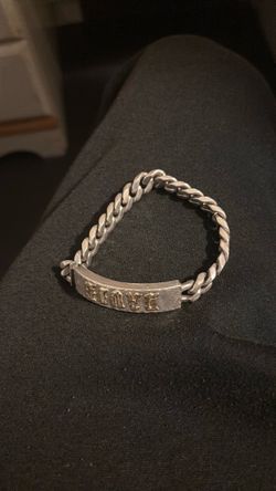 Sliver bracelet with Gold name “David” shoot me an offer