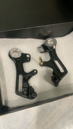 2 surron ultra bee brake mounts