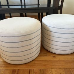 Two Round Ottomans 