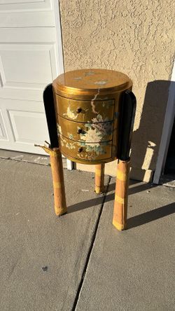 Oriental Hand Painted Black and gold lacquered Chinese design three drawer chest, painted with bird and floral scenes (37”high  16” Wide) store closed