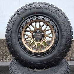 17" LOCK rims w/ 33" Delium AT tires